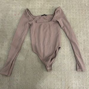 NEW. Light brown forever 21 body suit size small